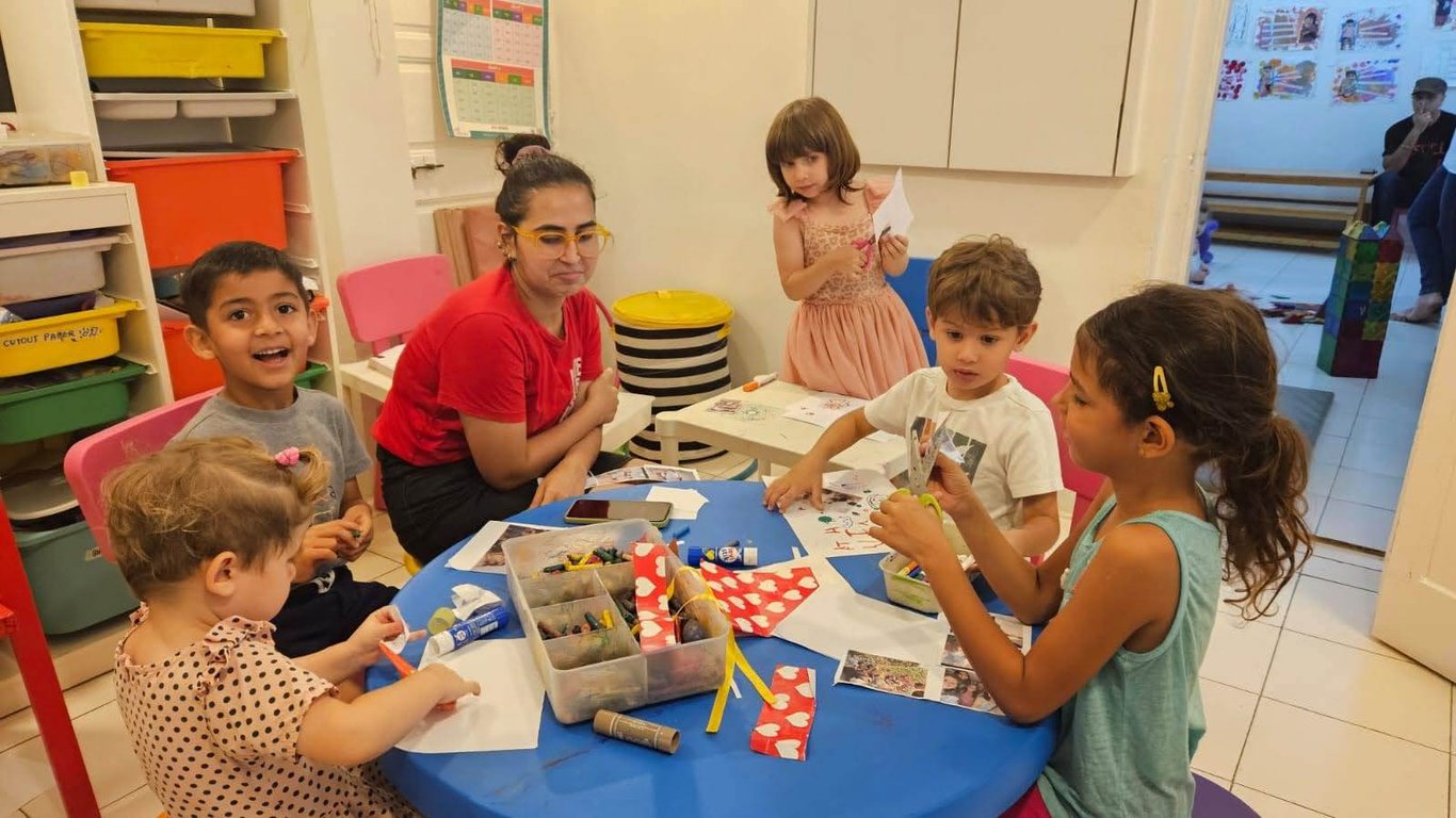 Watching kids craft. Offering support but not direction