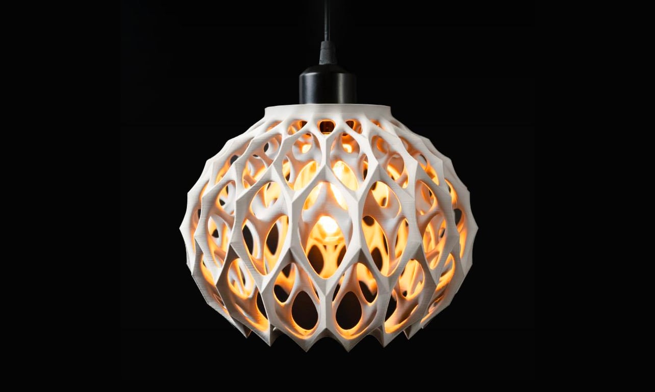 A lamp shade with 3D printed motif