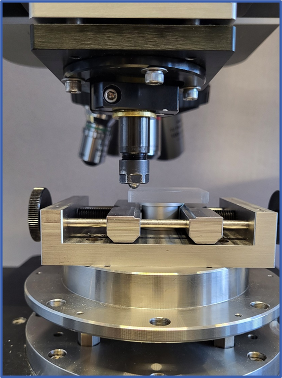 6mm Ball holder positioned above a PMMA sample.