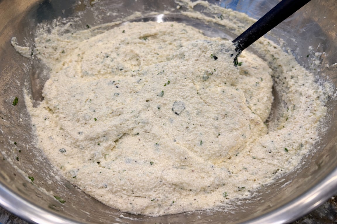 Soft, seasoned, and spreadable—the quiet backbone of the lasagna.