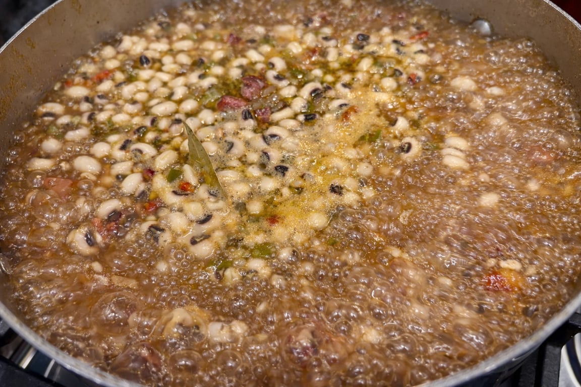 After skimming, the broth should look glossy and clean