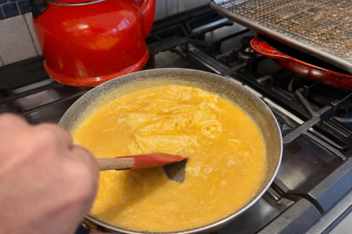 Long pulls give the eggs time to form soft, generous curds.