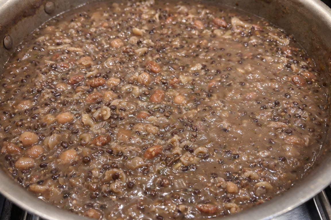 Pasta cooking directly in the beans, sauce forming naturally