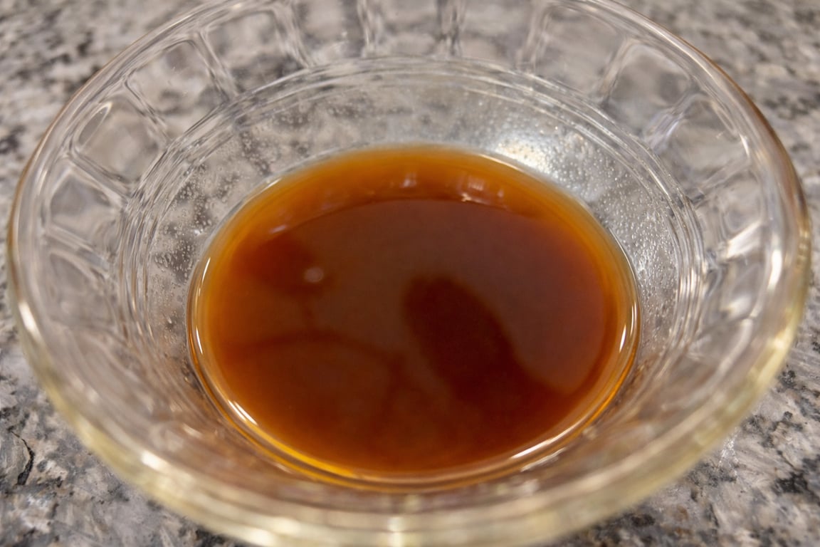 Oyster sauce loosened with white wine into a thin sauce.