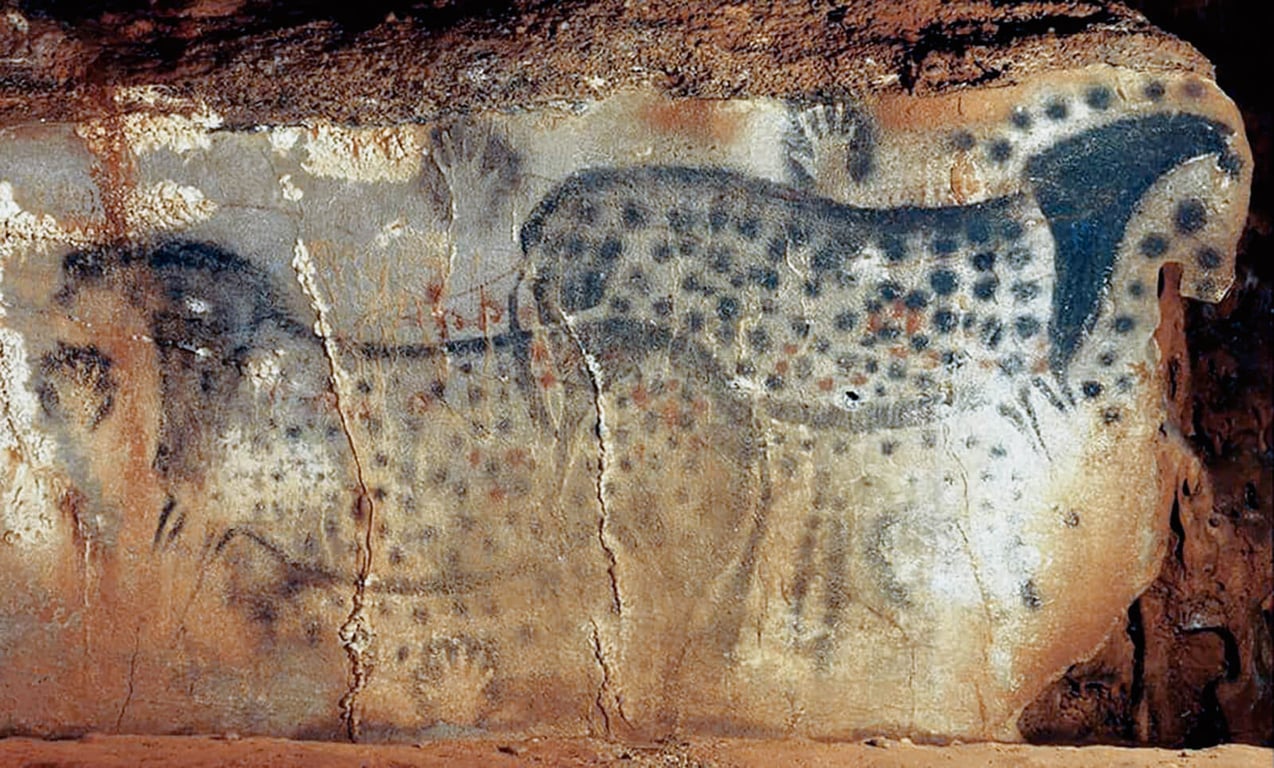 The Horses of Pech-Merle Cave in France, created aaround 29,000 years ago.