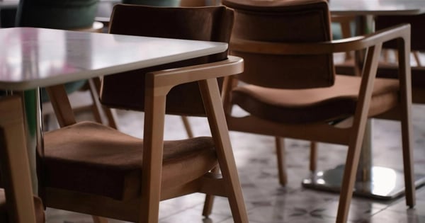 A warm, inviting coffee table setting symbolizing the collaborative, partner-centered approach of The Common Table.