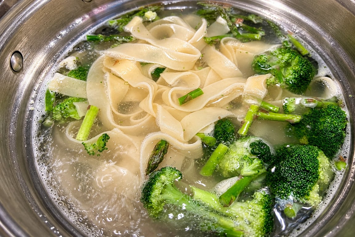 The vegetables cook for 4 minutes with the pasta so they stay crisp, not mushy.