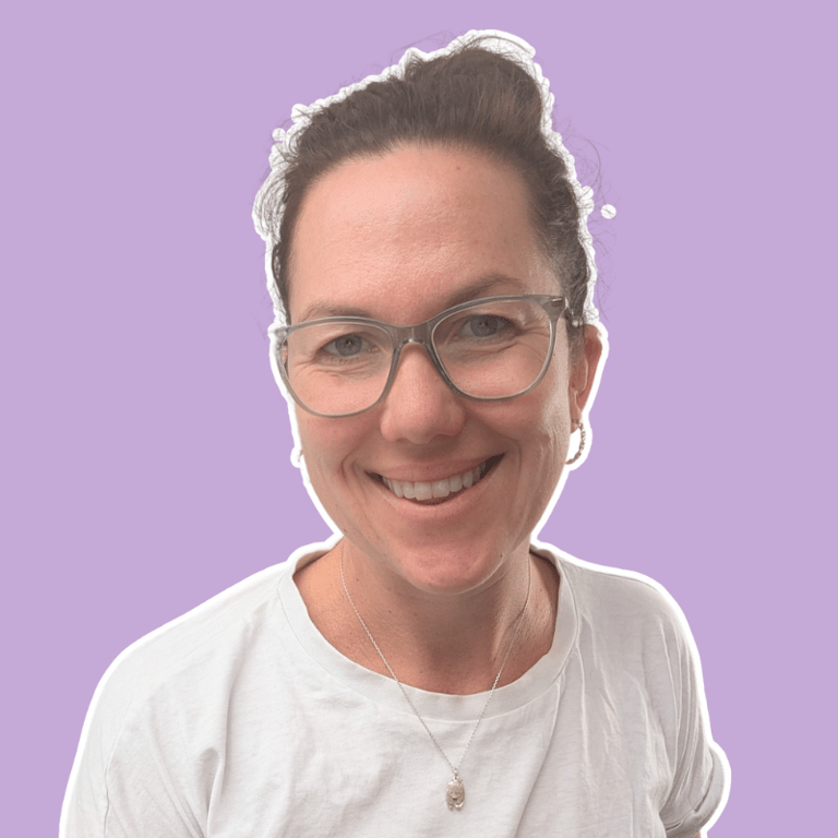 Marie-Pier is a smiling woman with a short curly brown hair and a colourful top full of bees and flowers.