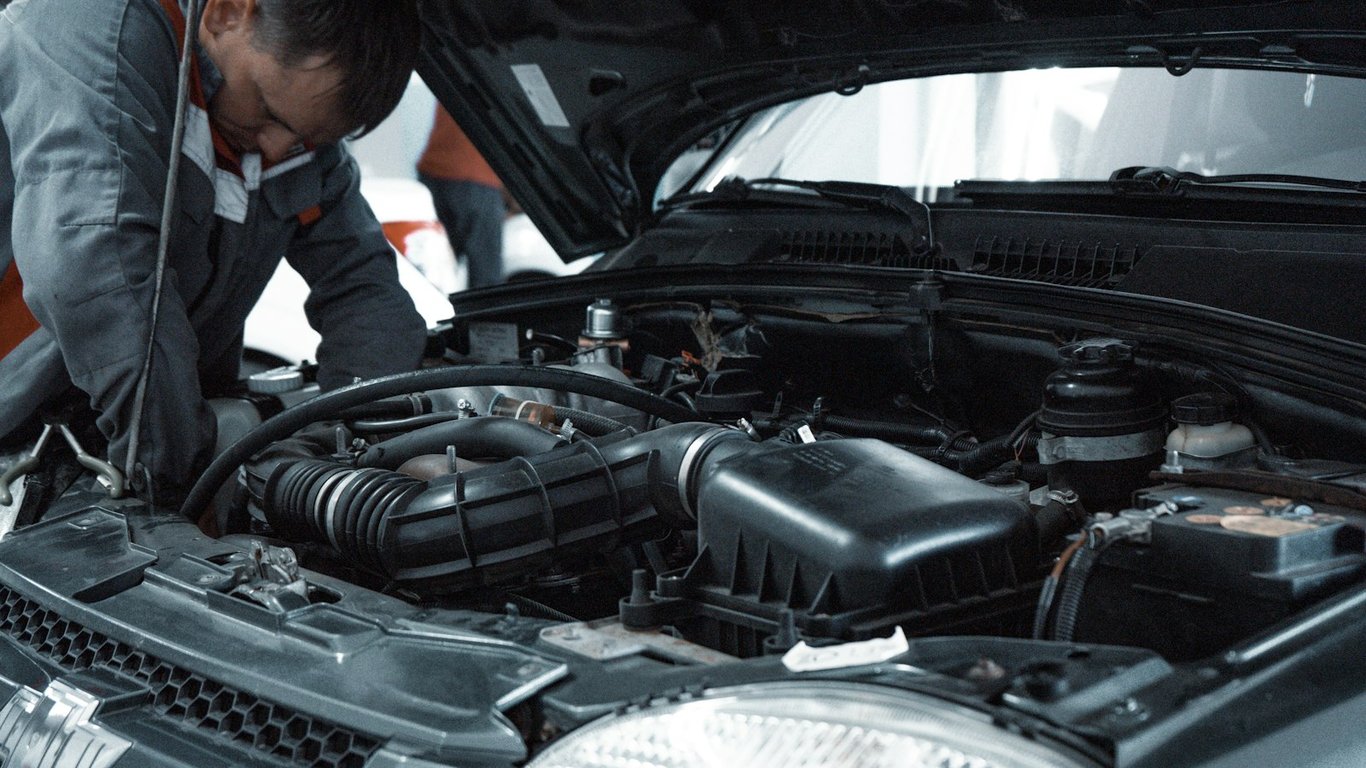Technician dispatch board for an automotive equipment service team. Photo by Kate Ibragimova on Unsplash