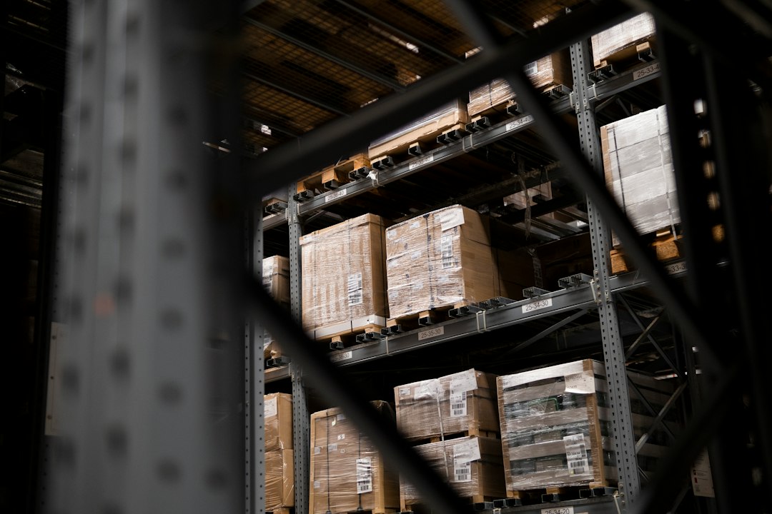 Warehouse pallets and cases: purchase order item entry depends on knowing which unit of measure the vendor price is for. Photo by Arum Visuals on Unsplash