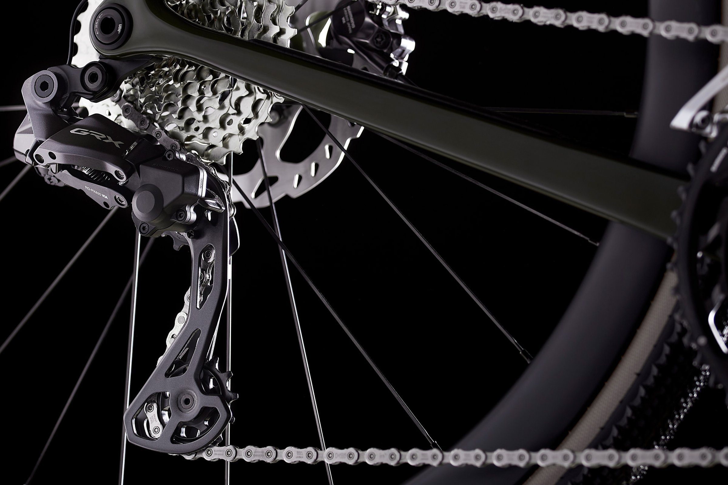 Grønn MMR X-Tour 00 detalj av bakgir og kjede.