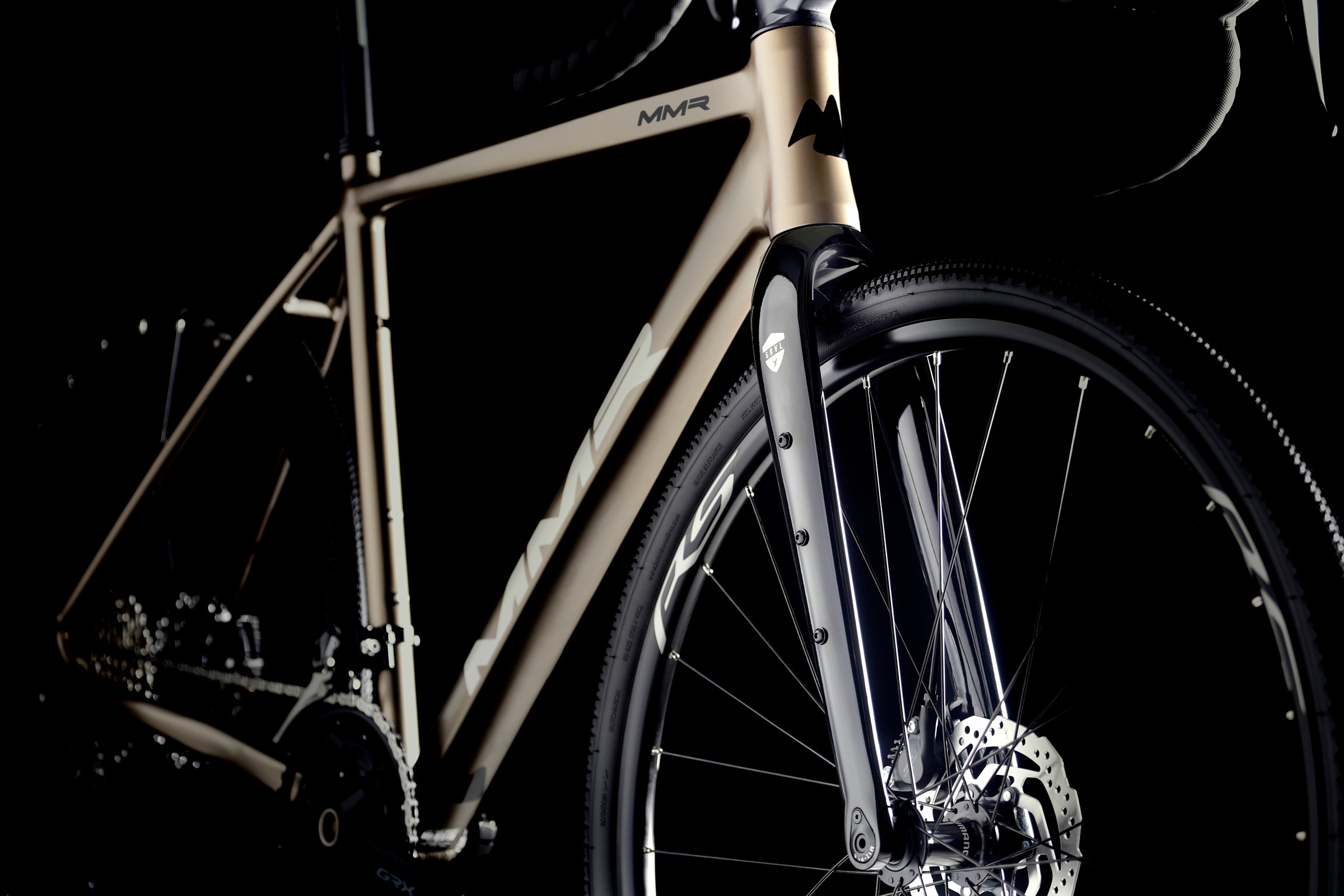 Beige MMR X-Grip 10 forfra med fokus på ramme og gaffel.