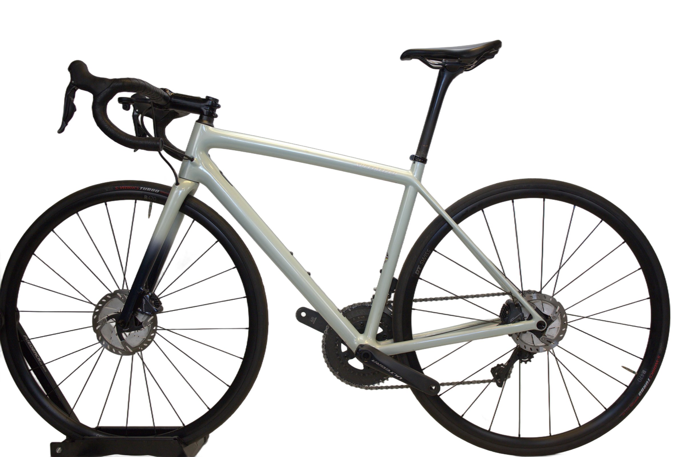 Lys grønn Specialized Aethos Expert fra siden.