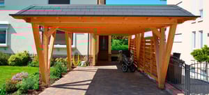 Huge wooden carport in the sun.