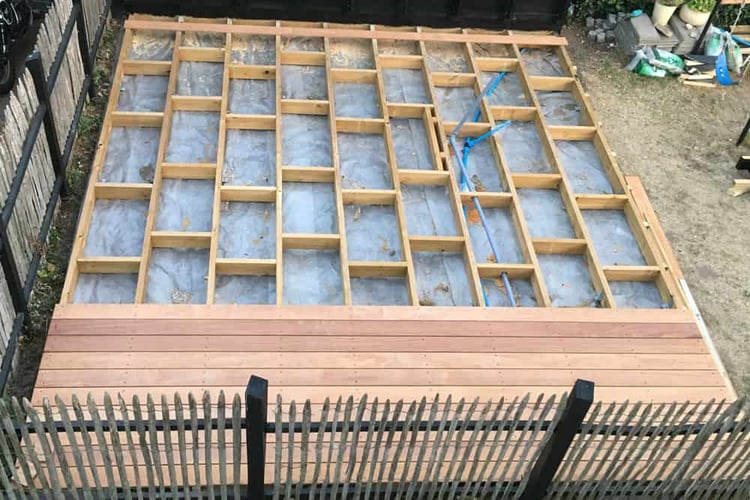 A wooden deck build with GroundPlug® Screw Piles in the making.