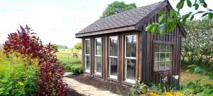 Garden shed with windows.