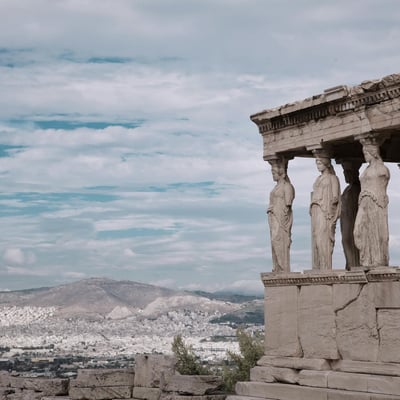 Distant view of the Acropolis rising above the urban sprawl of Athens