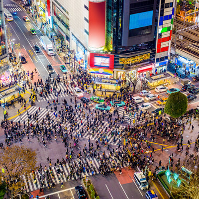 Aerial view of busy Shibuya Crossing in Tokyo, symbolizing the importance of organizing logistics and keeping groups aligned during travel.