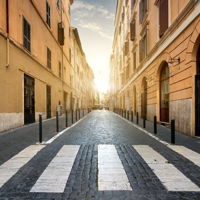 Open street in Europe at sunrise, representing the fresh start and freedom educators experience when switching to Blue Dot.