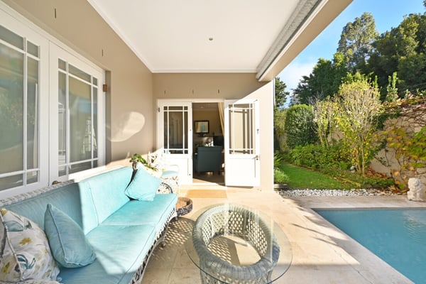 Chelsea Village four bedroom home with enclosed garden, pool and double garage