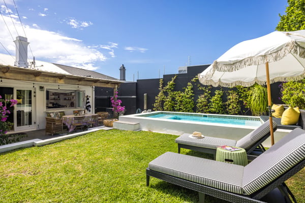 Stylish interior designed Sea Point home with parking and garden