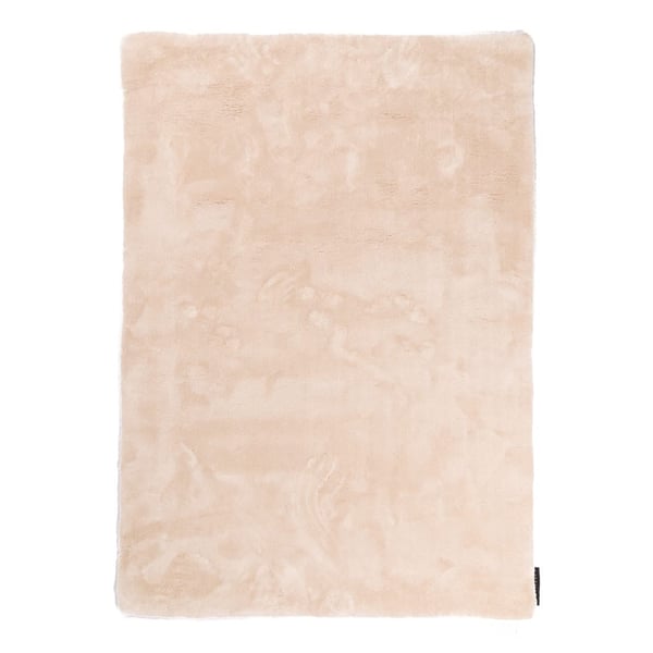 hoogpolig vloerkleed met een zachte, glanzende uitstraling en een effen kleurverloop.