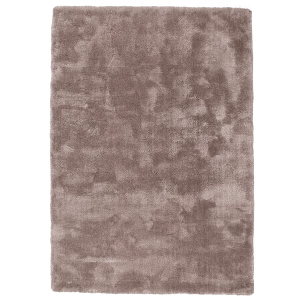 hoogpolig vloerkleed met een zachte, glanzende uitstraling en een effen kleurverloop.