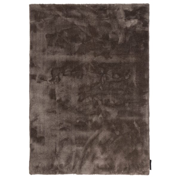 hoogpolig vloerkleed met een zachte, glanzende uitstraling en een effen kleurverloop.