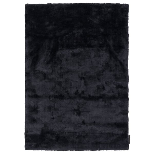 hoogpolig vloerkleed met een zachte, glanzende uitstraling en een effen kleurverloop.