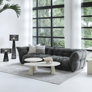XOOON Bank Bellagio in lichtgrijze stof met slanke metalen poten in moderne woonkamer
