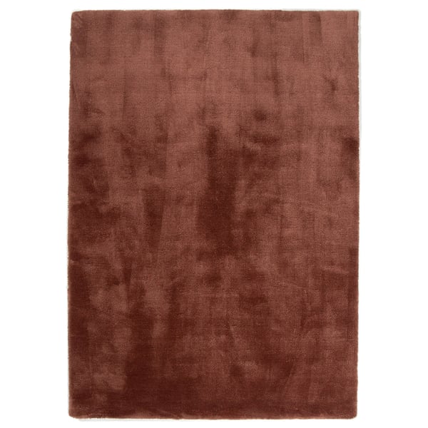 hoogpolig vloerkleed met een zachte, glanzende uitstraling en een effen kleurverloop.