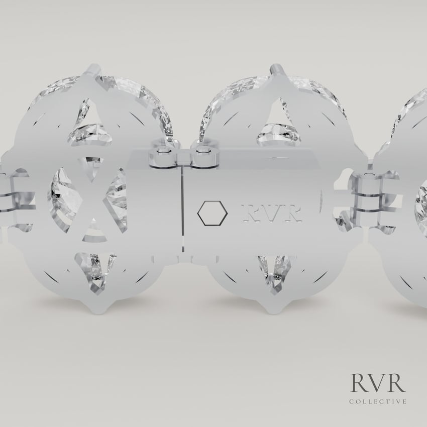 The hidden clasp from the wrist side, with the hexagon button and RVR engraved