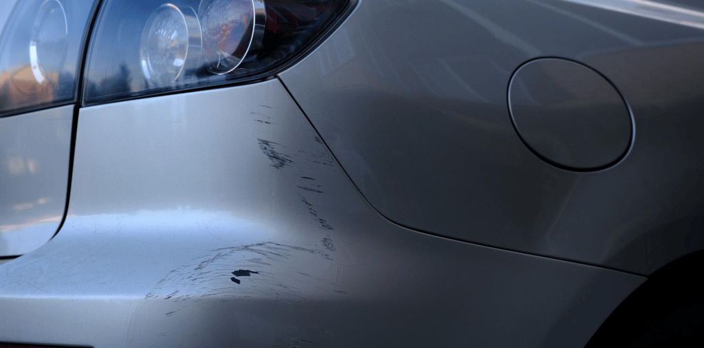 Car Hit While Parked And Grazed