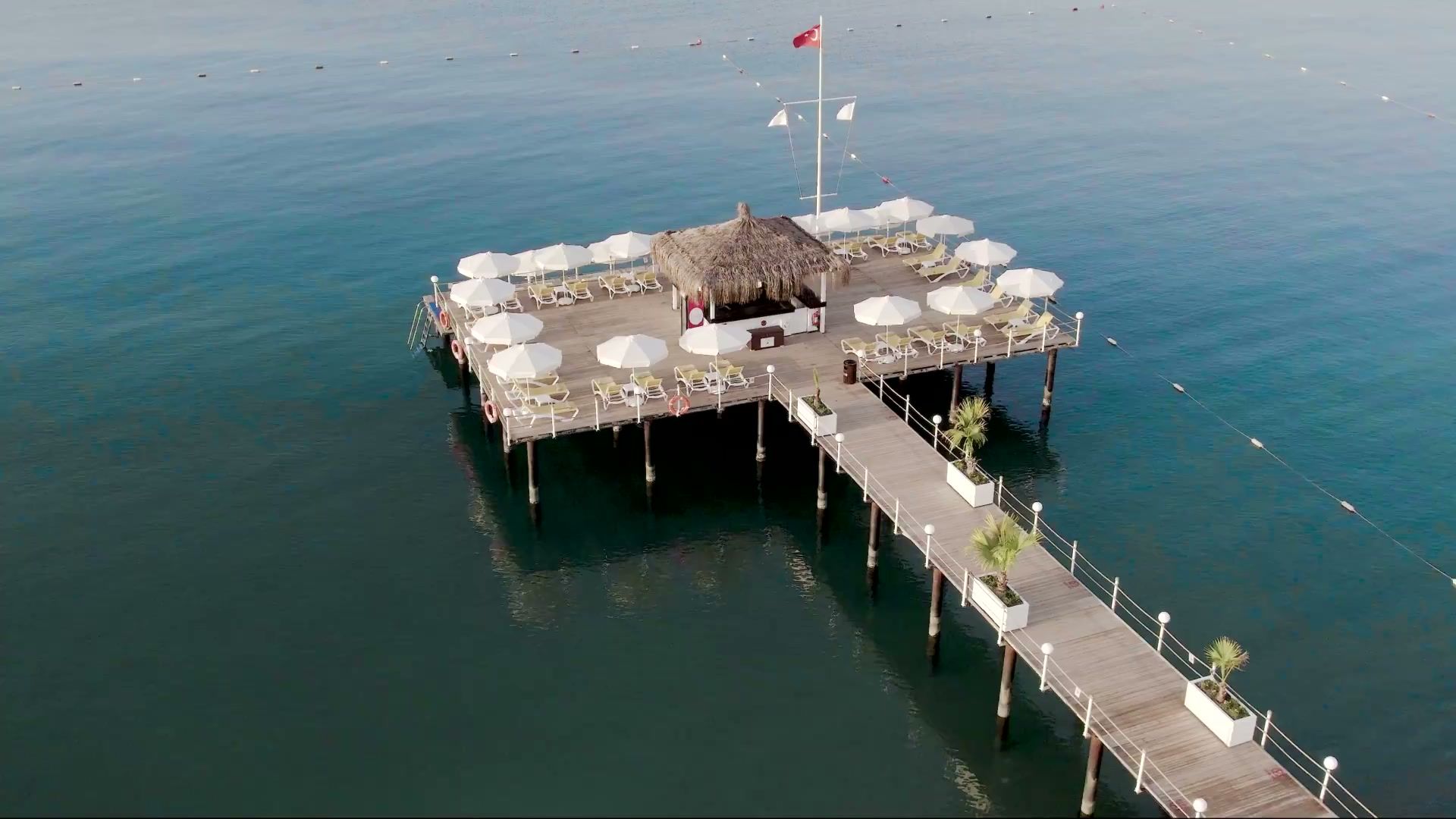 Ramada Resort Lara’s pier stretching into the sea