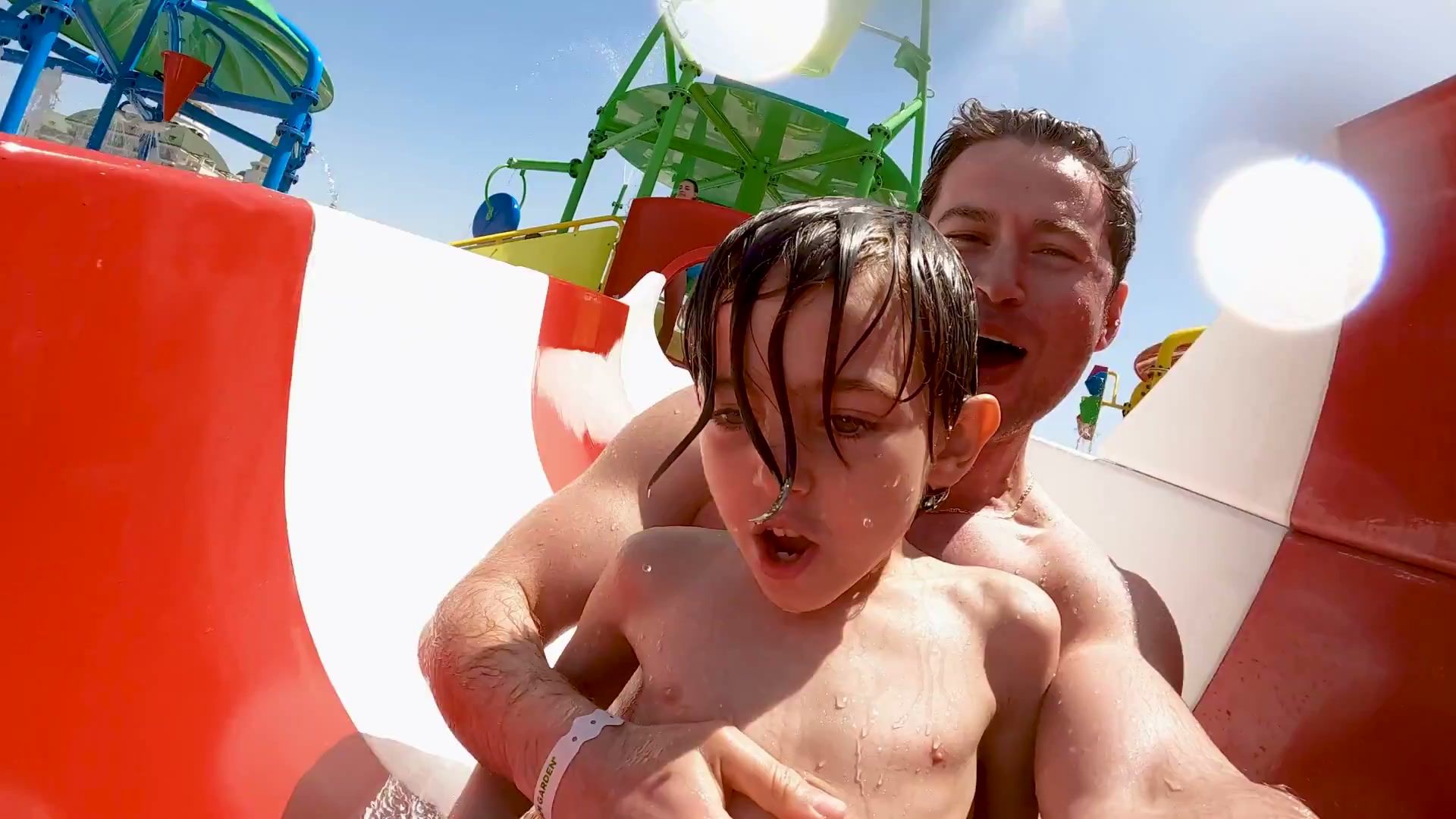 Family fun on a water slide at the aquapark
