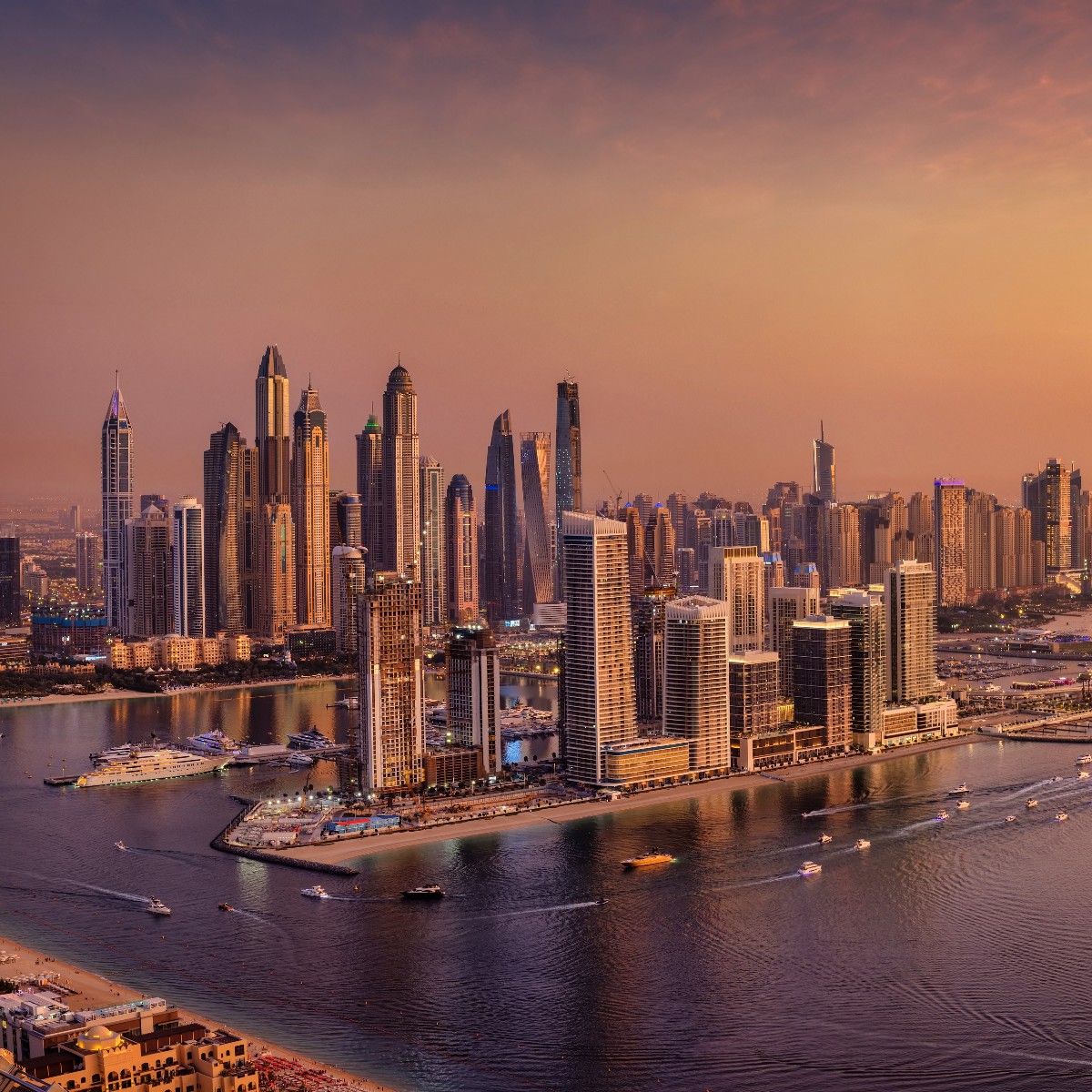 Elevated, panoramic sunset view of the modern Dubai Marina