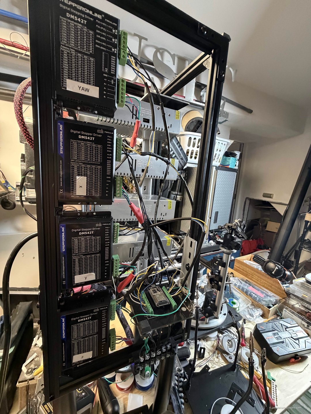 Power tower full view with PSUs, drivers, junction box, and patch bay