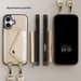 Selencia Coque de télephone Sera avec cordon et porte-cartes enveloppe pour Apple iPhone 17 - Champagne