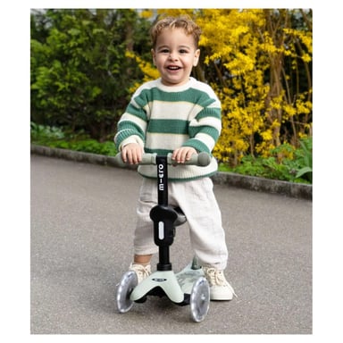Patinete evolutivo Micro Mobility Mini Micro Deluxe Rock & Go LED 6-en-1 asiento basculante ruedas LED Verde salvia