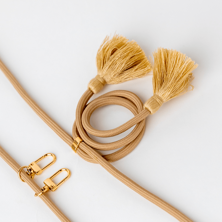 Bandoulière Cordon Universelle Amovible Beige avec Pompons Bigben - Neuf