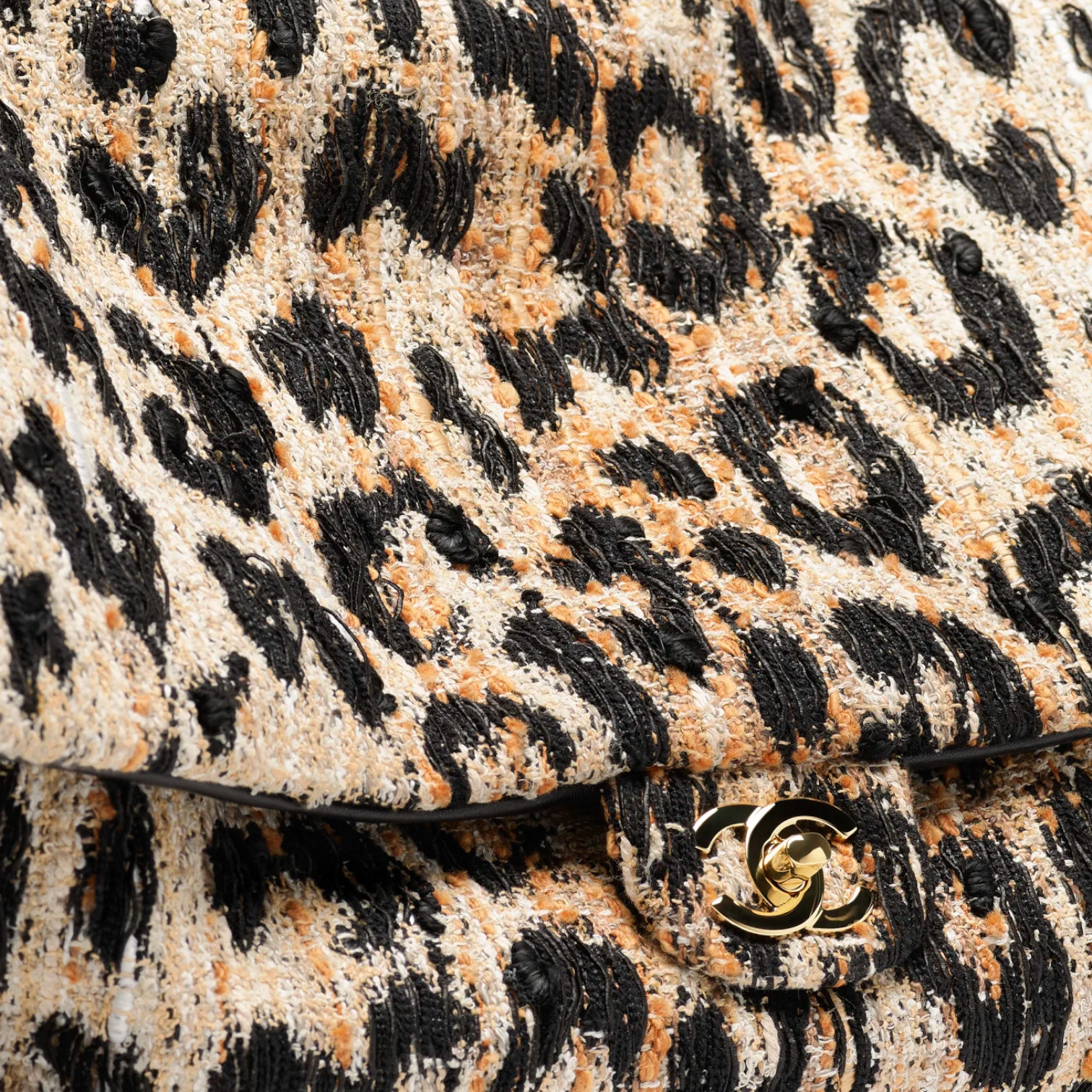 Chanel Chanel Maxi Flap Bag Tweed, Mixed Fibers & Gold-Tone Metal Brown, Black & White – detail view in premium quality with AA+ craftsmanship