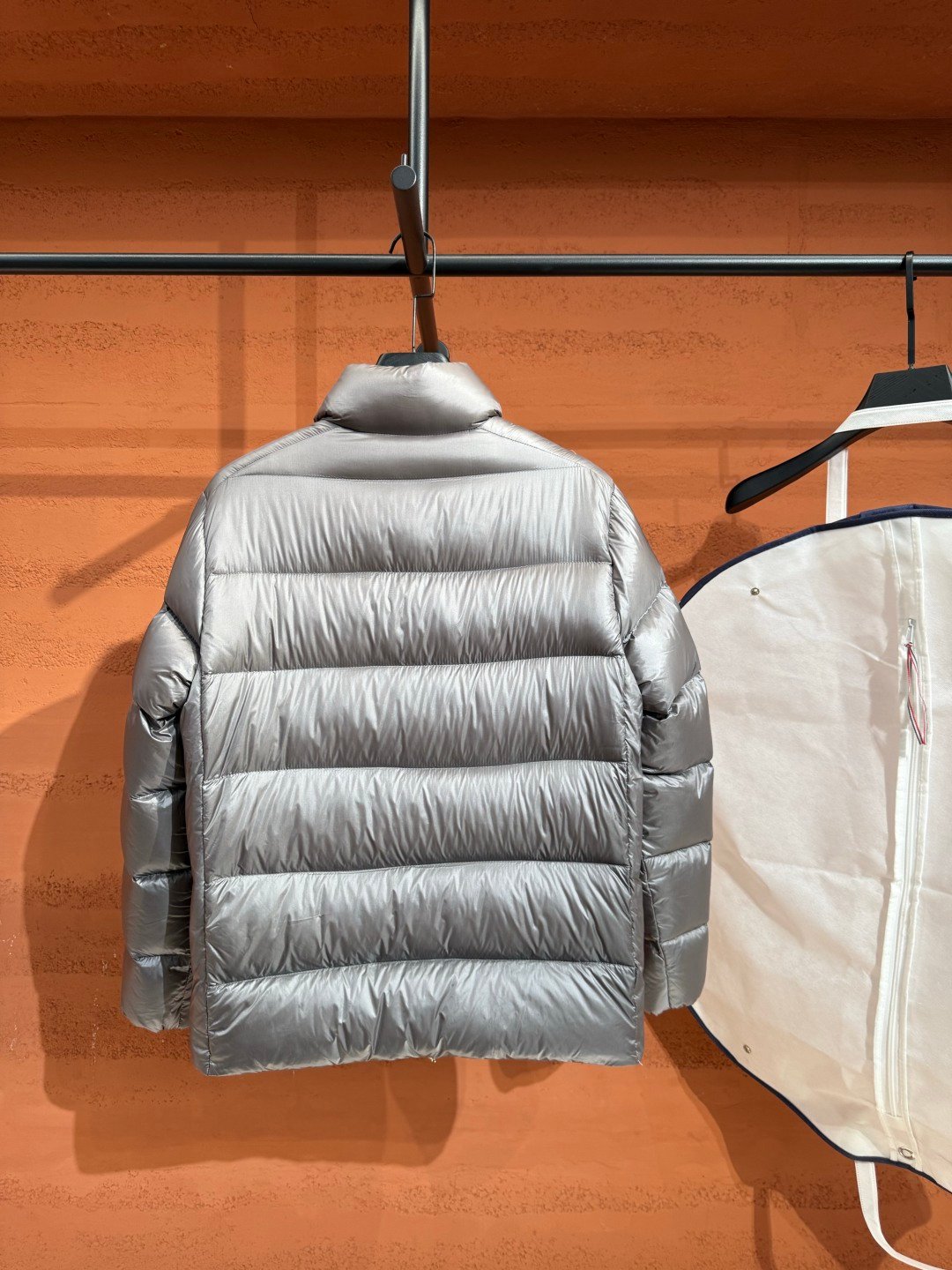 Prada Prada Puffere Jacket Silver – back view in premium quality with AA+ craftsmanship