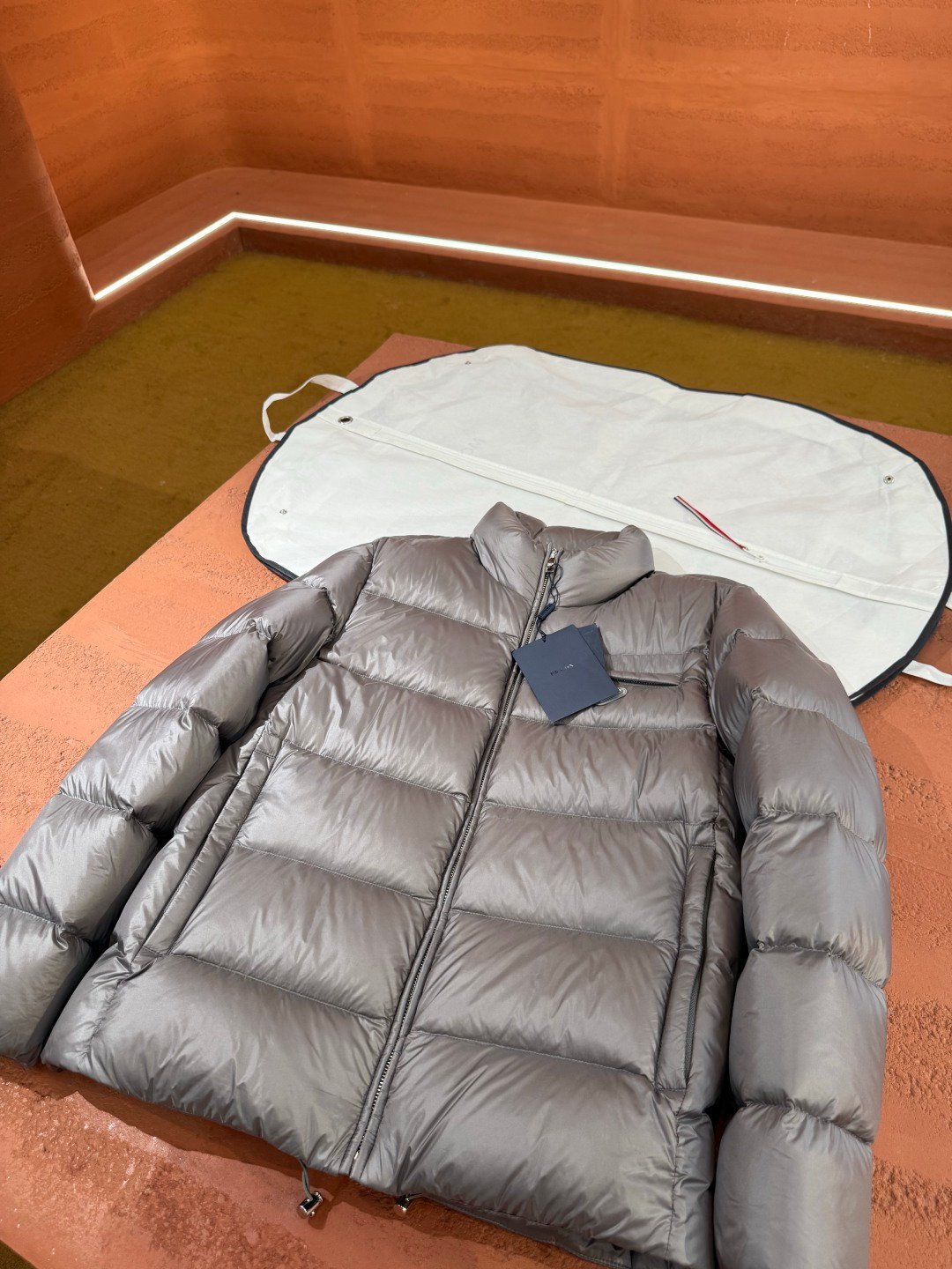 Prada Prada Puffere Jacket Silver – detail view in premium quality with AA+ craftsmanship