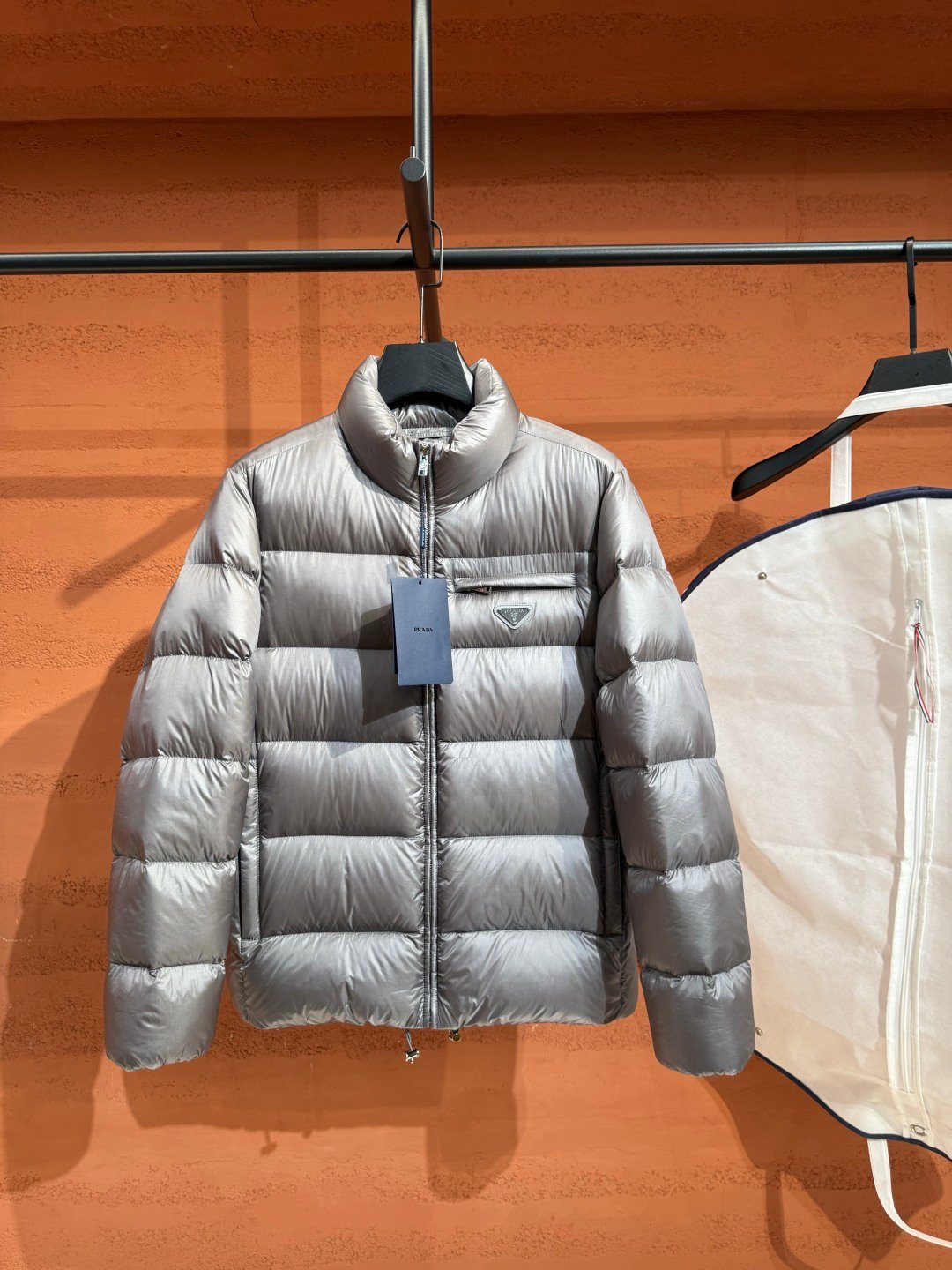 Prada Prada Puffere Jacket Silver – side profile view in premium quality with AA+ craftsmanship