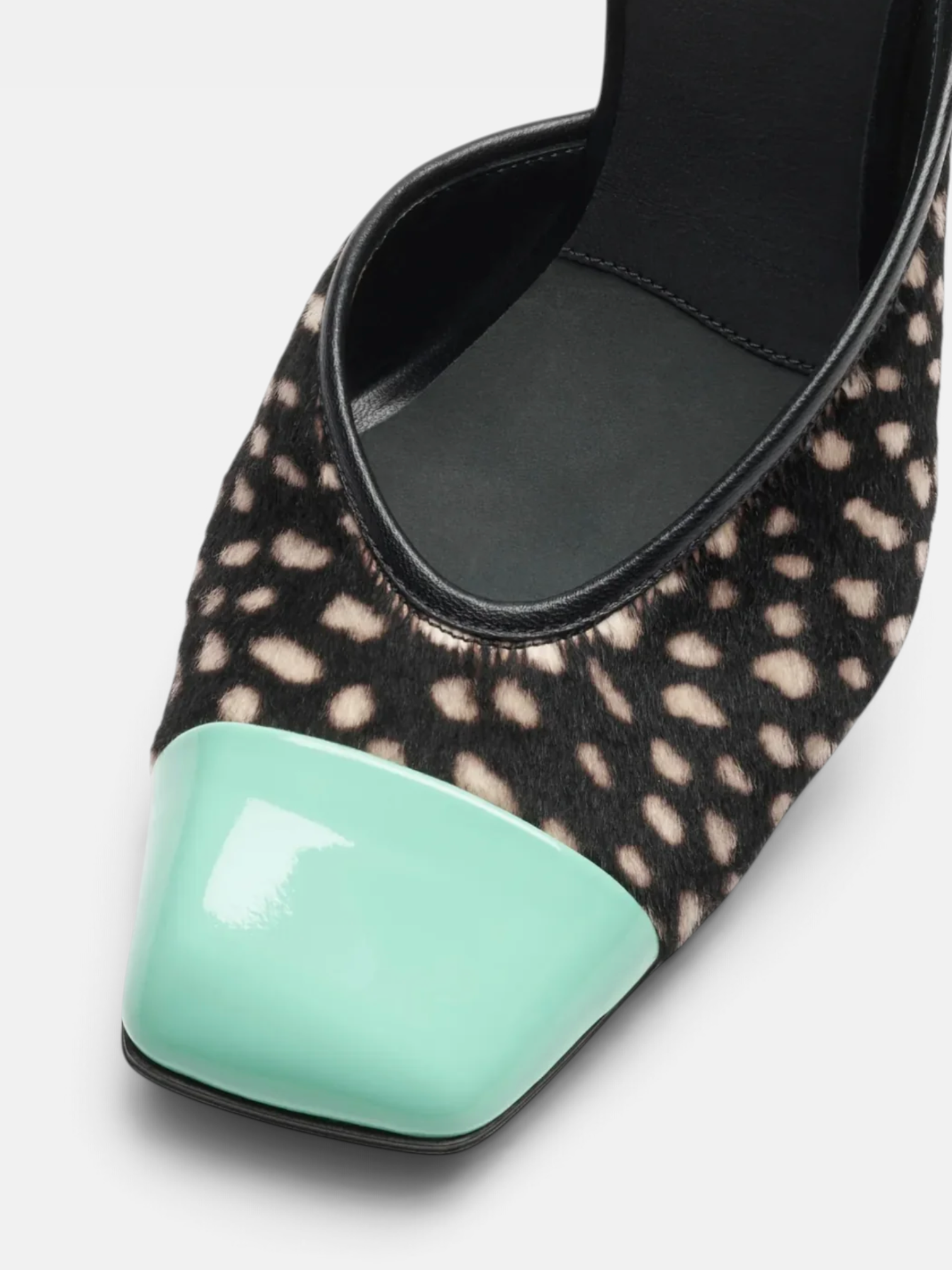 Chanel Chanel Mules in Lambskin & Patent Calfskin  in Black – close-up detail view in premium quality with AA+ craftsmanship