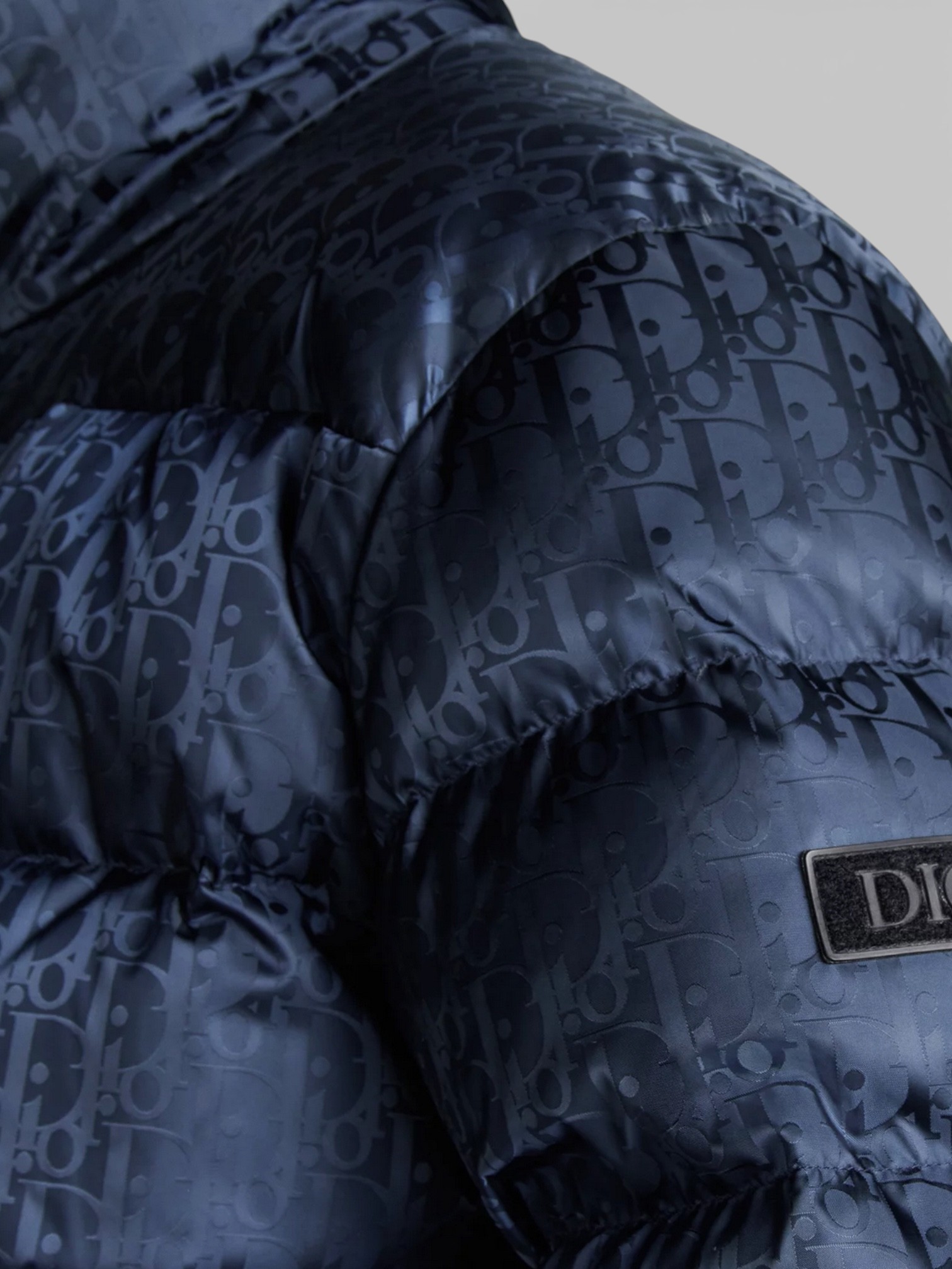 Dior Dior Oblique Down Jacket Navy Blue – side profile view in premium quality with AA+ craftsmanship