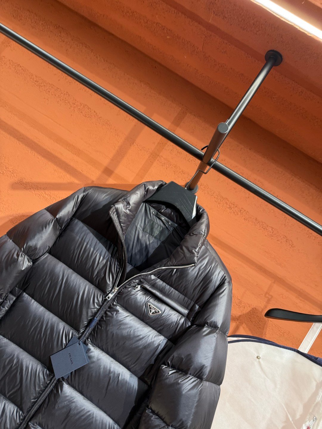 Prada Prada Puffer Jacket Black – close-up detail view in premium quality with AA+ craftsmanship