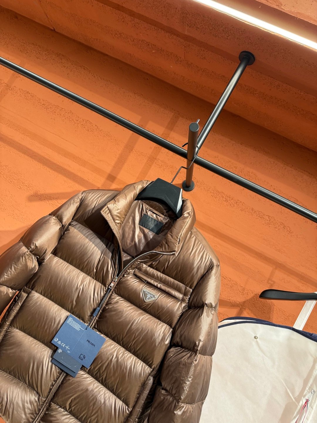 Prada Prada Puffer Jacket Brown – close-up detail view in premium quality with AA+ craftsmanship