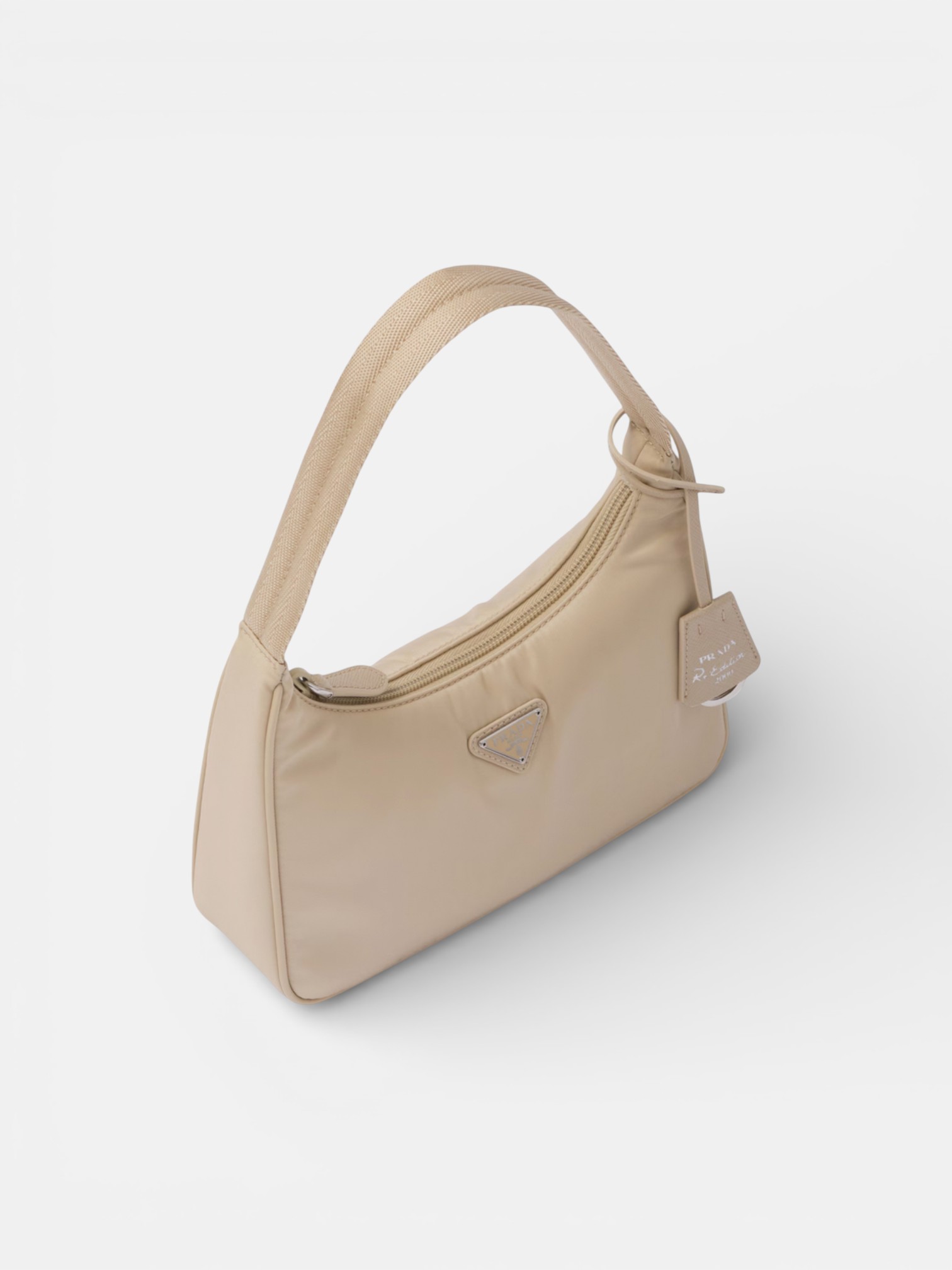 Prada Prada Re-Edition 2000 Mini-Bag Warm Cream – side profile view in premium quality with AA+ craftsmanship