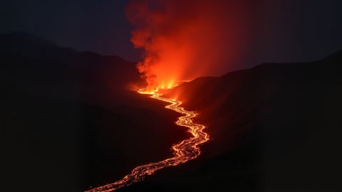 The Glowing Lava Flow of Kilauea at Night Desktop Preview